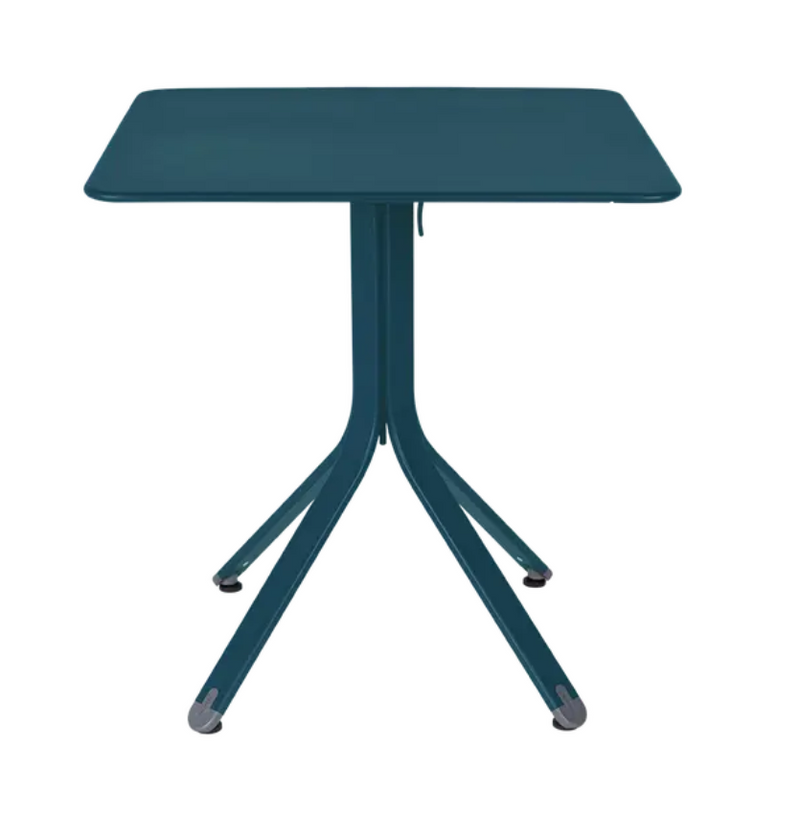 Load image into Gallery viewer, Fermob Rest'O folding outdoor metal table in Acapulco Blue, 71x71cm, with a sleek, modern design for outdoor spaces.

