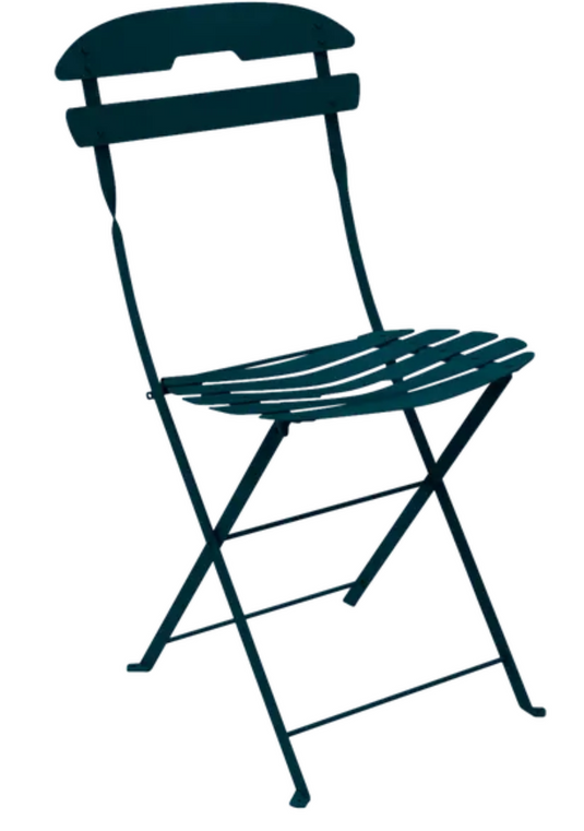 Fermob LA MÔME Chai folding chair with colorful Acapulco-style design, lightweight and foldable for patio or outdoor seating.