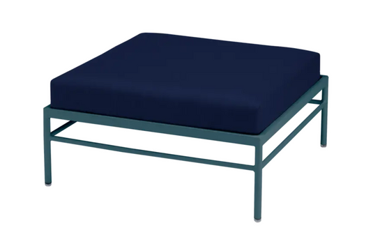 Midnight blue Fermob Rivage Ottoman outdoor furniture with aluminum frame, designed for stylish outdoor lounging.