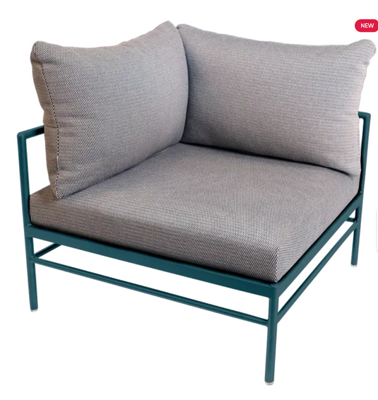 Fermob Rivage corner outdoor armchair with metal frame and striped fabric cushions, part of the Acapulco Straciatella collection.