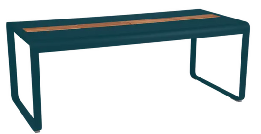Bellevie outdoor dining table by Fermob, 196x90 cm wood and metal, blue with storage, seats eight, stylish garden furniture.