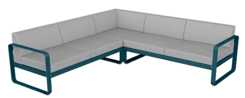 Load image into Gallery viewer, Fermob Bellevie Composition 2 outdoor lounge sofa set with blue Acapulco and grey Flanel cushions on a patio.
