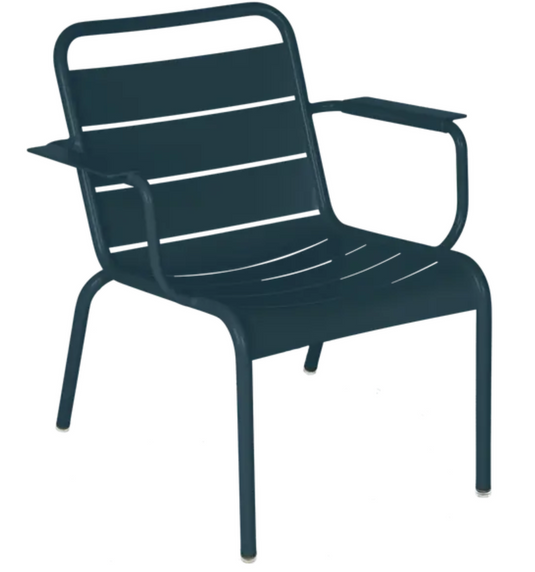Blue and white Fermob Luxembourg garden armchair lounge with a contemporary design and comfortable seating.