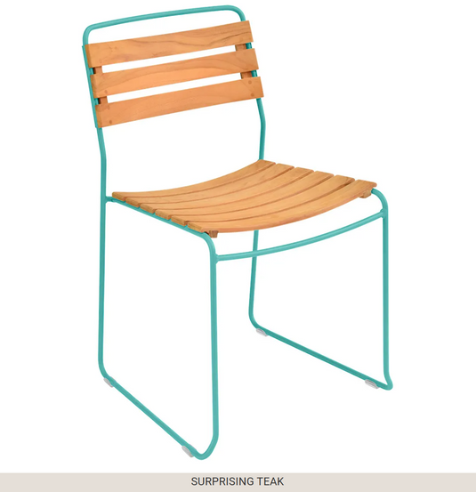 White Fermob Surprising Teak Chair, outdoor metal Acapulco-style chair with a sleek design and sturdy frame.