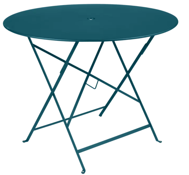 Load image into Gallery viewer, Fermob Acapulco blue teak round outdoor bistro table with a parasol hole, ideal for restaurant and patio settings.
