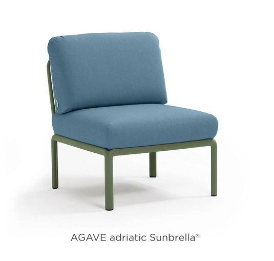 Nardi Komodo Central Sofa Module in Agave color, part of the outdoor Komodo sectional sofa on a hotel patio.