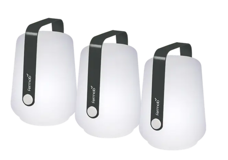 Load image into Gallery viewer, Set of three Fermob Balad mini outdoor lamps in antracite color, small ball-shaped lights measuring 12 cm tall.
