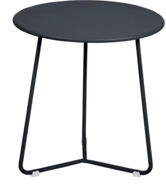 Small Fermob Cocotte occasional table in antracite color, with a round top and modern design, perfect for living room or patio use.