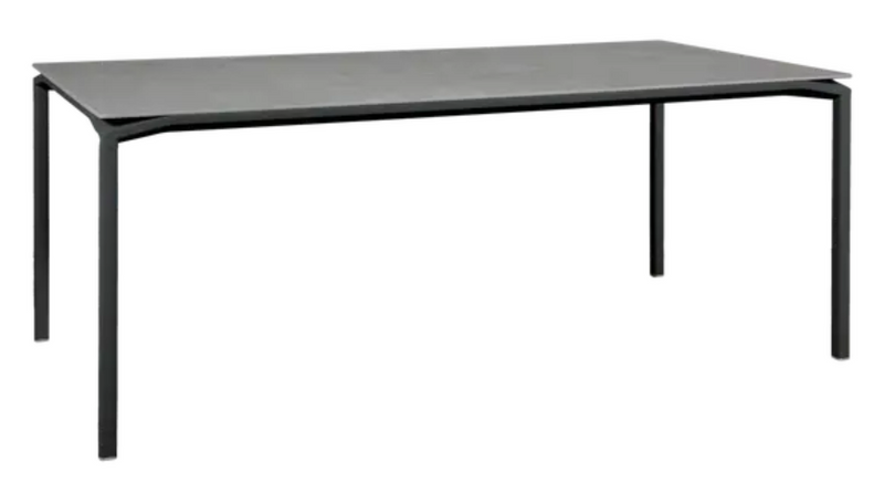 Load image into Gallery viewer, Fermob CALVI Kreta mineral dining table in antracite grey, 195x95 cm, eight-seater with durable stone tabletop.
