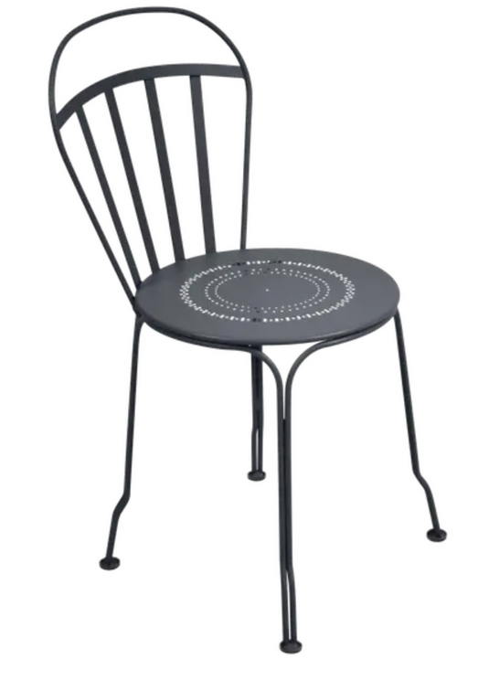 Fermob outdoor LOUVRE chair in antracite color, featuring a modern design with slatted back and armrests for outdoor seating