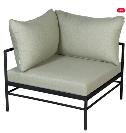 Fermob Rivage Corner Armchair in antracite and meadow green metal outdoor sofa with corner design on patio setting
