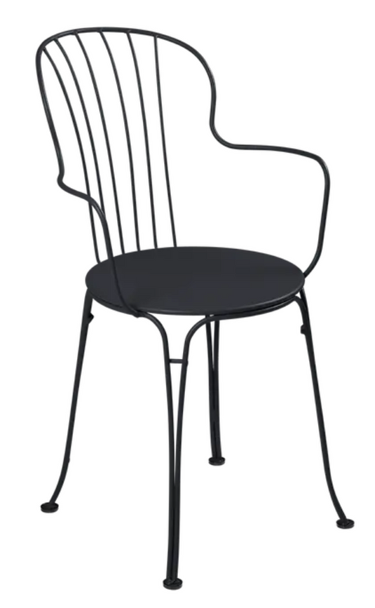 An outdoor metal armchair in antracite color by Fermob, featuring a sleek, modern design for outdoor patio or garden use.