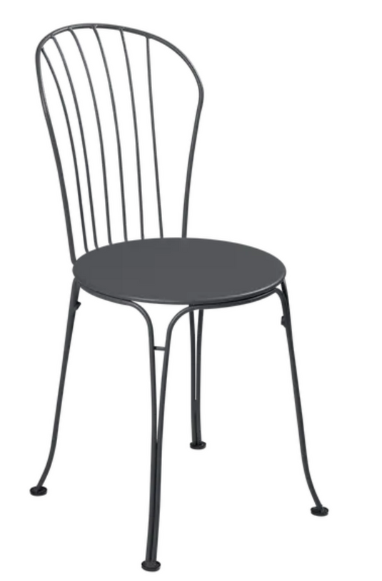 Fermob OPÉRA+ outdoor metal chair in antracite color, featuring a sleek design suitable for patio or restaurant seating.