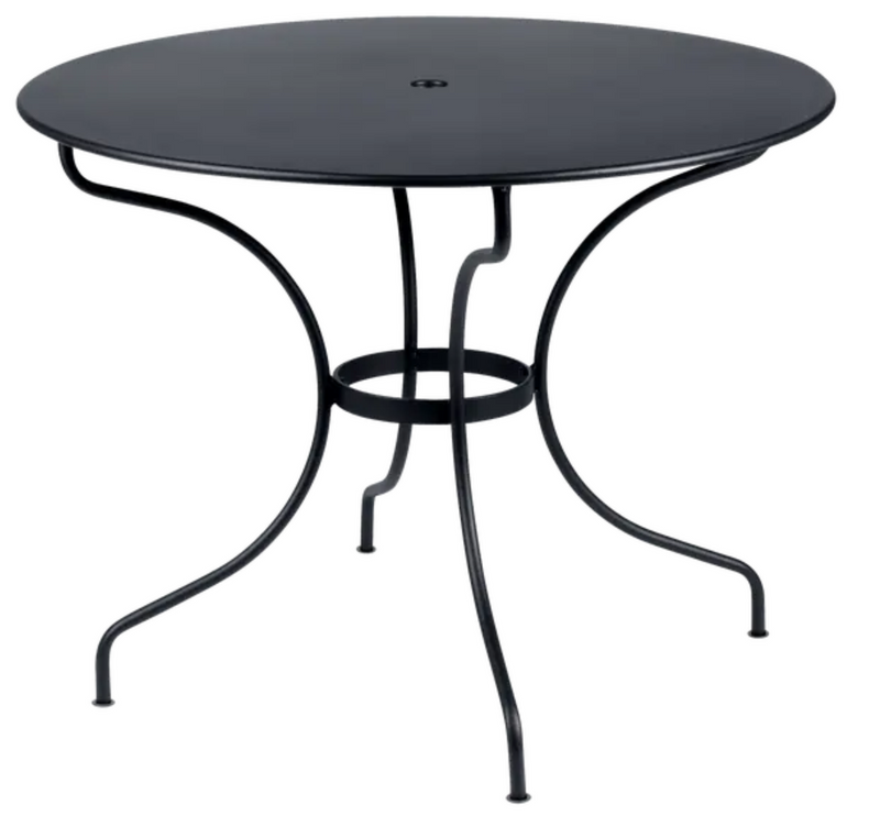 Load image into Gallery viewer, Fermob OPÉRA+ outdoor metal table with a 96 cm diameter in antracite, designed for five-seater patio dining.
