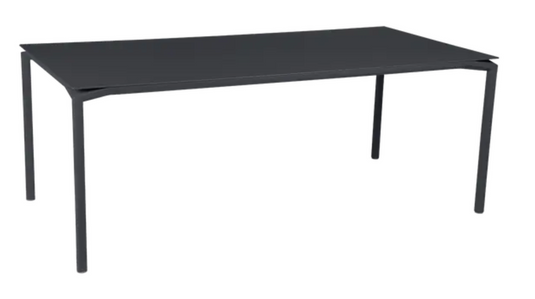 Fermob Calvi rectangular outdoor dining table, 195x95 cm, in anthracite, suitable for outdoor and indoor use.