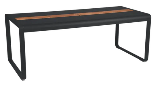 Fermob Bellevie outdoor dining table in wood and metal, 196x90cm, with storage, designed for eight seaters, in an anthracite finish.