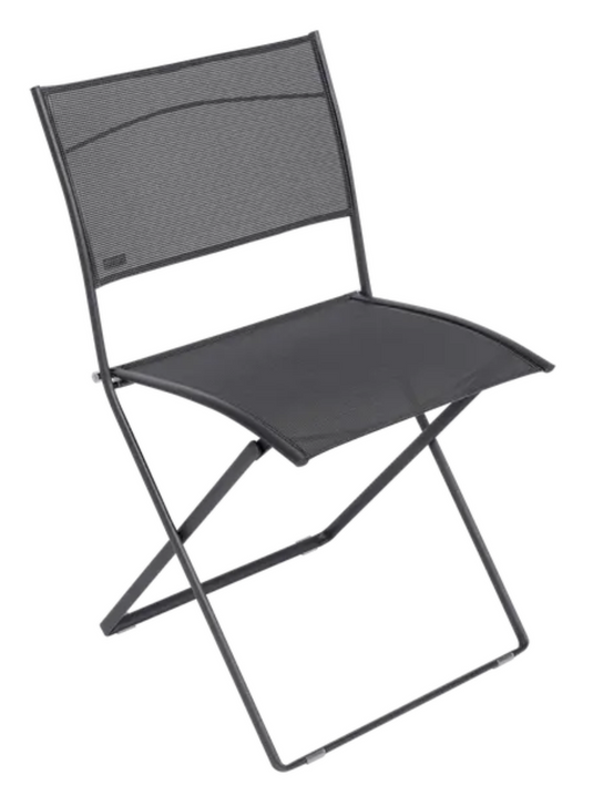 Fermob Plein Air folding chair in antracite color, lightweight outdoor furniture with a sleek, modern design.