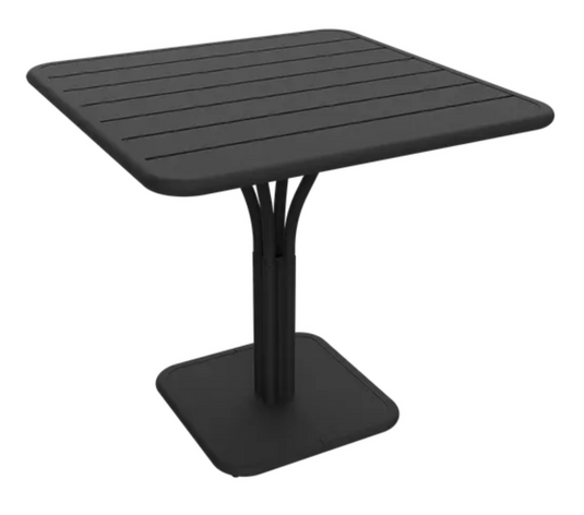 Fermob Luxembourg outdoor pedestal table in antracite and white, 80x80 cm, with a modern square design for patio or garden use.
