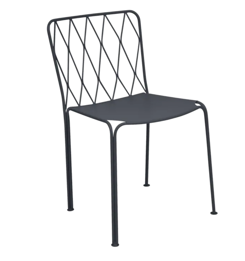 Load image into Gallery viewer, Stacked Fermob Kintbury outdoor metal chairs in antracite white, ideal for restaurant or outdoor furniture settings.
