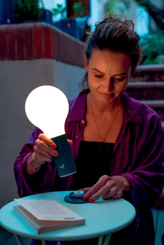 Fermob APLÔ Lamp H.24 with magnetic base, outdoor lighting fixture showcasing modern design and adjustable positioning
