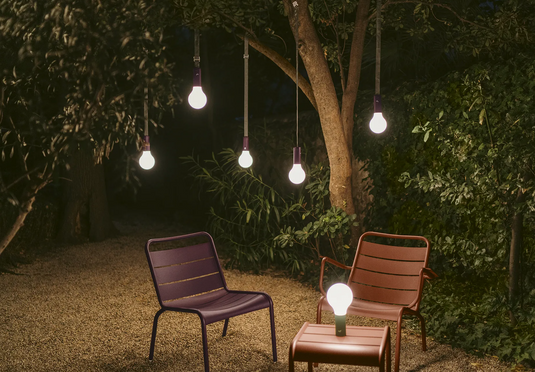 Fermob APLÔ Lamp H.24 suspended rechargeable light with strap, hanging from ceiling, modern design, sleek and stylish.