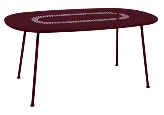 Fermob Lorette oval metal outdoor dining table, 160x90 cm, with black cherry finish, suitable for patio or garden dining.