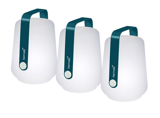 Set of three Fermob Ballad mini outdoor lamps with 12cm height, featuring small spherical design for outdoor lighting.