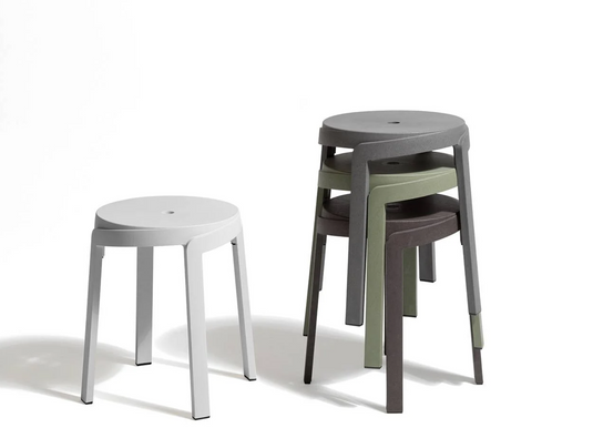 Nardi Stack Mini Stool, a sustainable outdoor chair with a modern design, shown on a patio setting in Ireland.