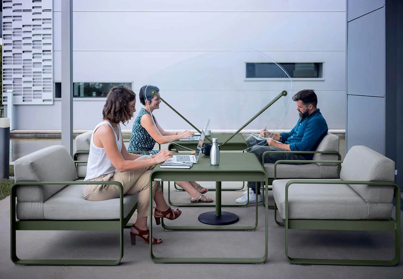 Load image into Gallery viewer, Fermob Bellevie armchair with metal frame and cushioned seat, stylish modern design for indoor or outdoor use.
