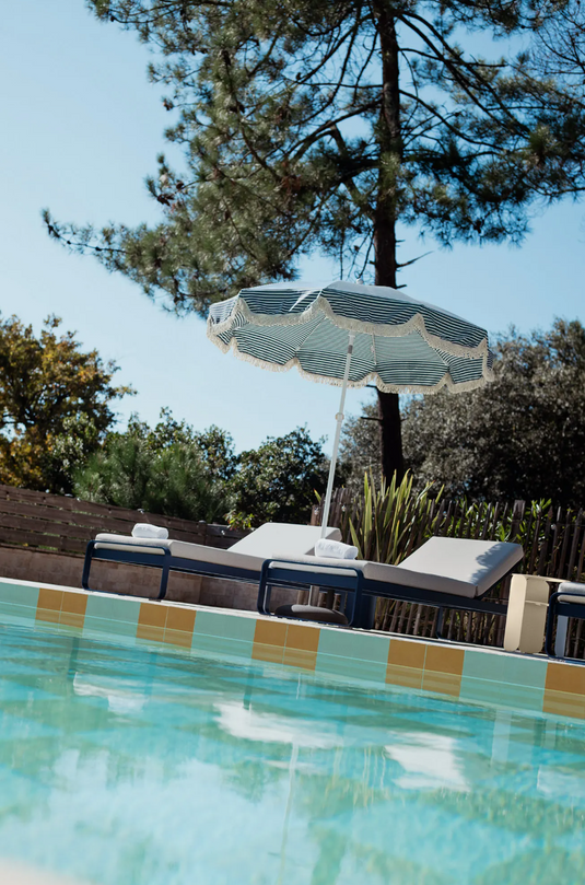 Fermob Bellevie premium sunlounger with a sleek design and comfortable cushioning, perfect for outdoor relaxation.