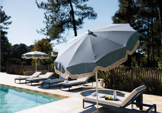 Fermob Bellevie Premium Sunlounger with adjustable backrest and sleek design for outdoor relaxation.