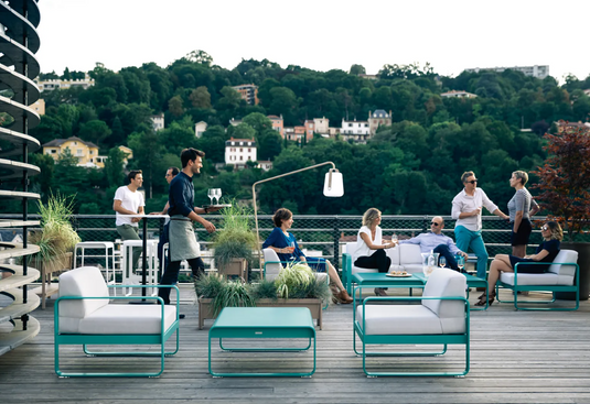 Fermob Bellevie 2-seater outdoor sofa with a sleek design and comfortable cushions, ideal for patio or garden lounging.