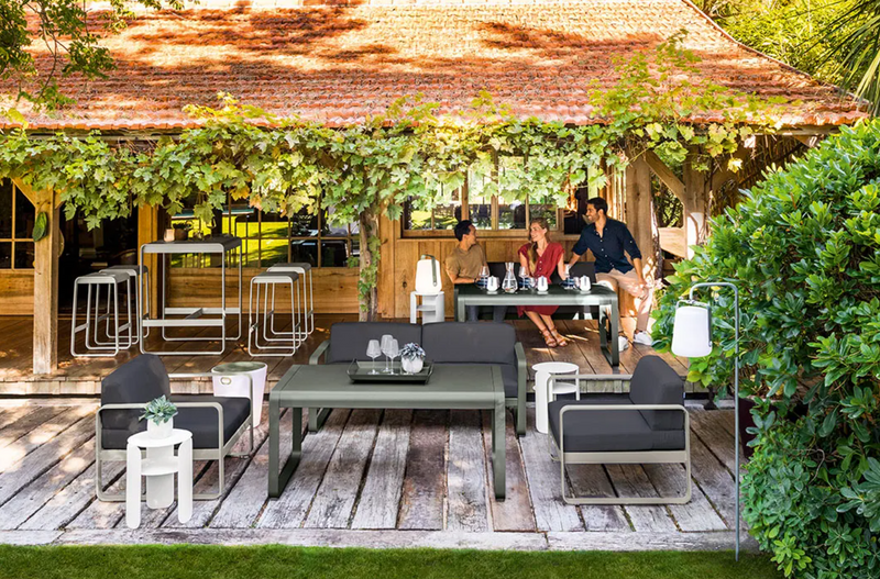 Load image into Gallery viewer, Fermob Bellevie 2-seater outdoor sofa with modern design and cushioned seating, perfect for garden or patio relaxation.
