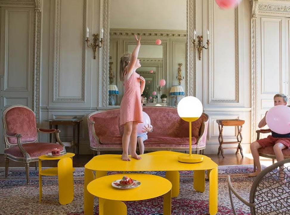 Yellow Fermob Bebop Low Table with a Ø80cm round top, outdoor furniture suitable for patio or garden spaces.