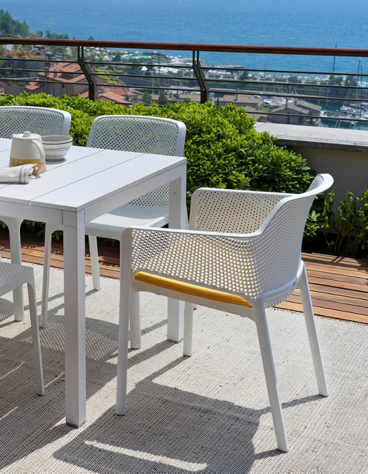 Nardi Rio Alu 140 Extensible outdoor table with white aluminum surface and modern design, ideal for patio or garden spaces.