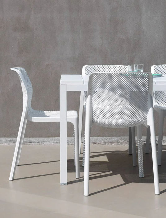 White Nardi Bit outdoor chair with a modern design, ideal for patio or garden seating.