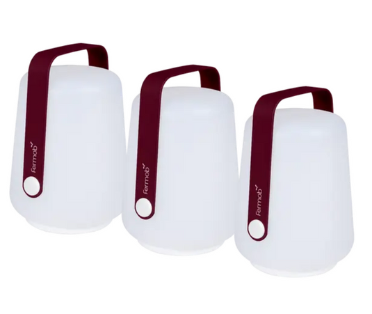Set of three black Fermob mini outdoor lamps, 12 cm tall, featuring small ball-shaped designs for outdoor lighting.