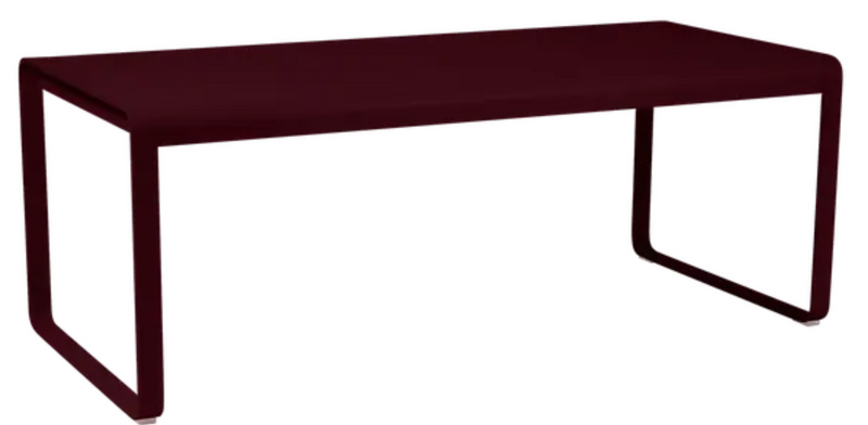 Load image into Gallery viewer, Black Fermob Bellevie outdoor dining table in black cherry finish, 196 x 90 cm, metal eight-seater for outdoor dining.
