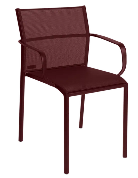 Black Fermob Cadiz outdoor armchair with black cherry aluminum frame and technical fabric seat, suitable for outdoor use.