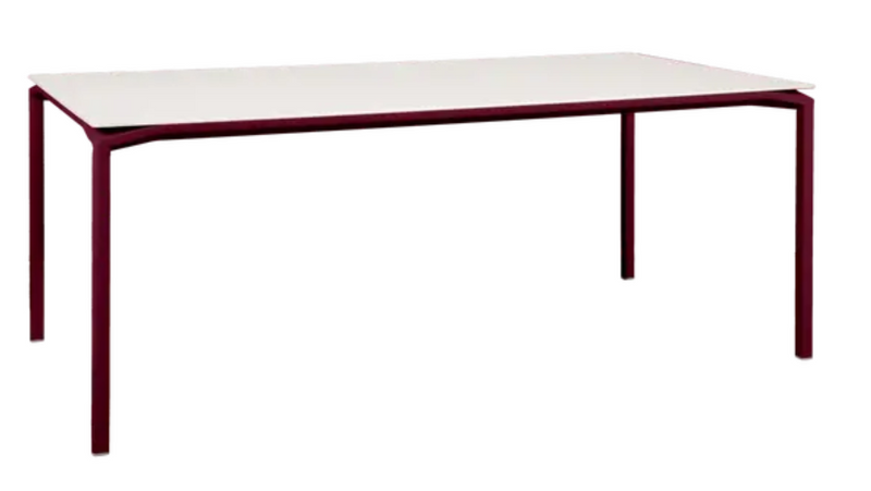Load image into Gallery viewer, Fermob Calvi Aeris mineral dining table with black cherry finish, 195 x 95 cm, eight-seater for modern dining spaces.

