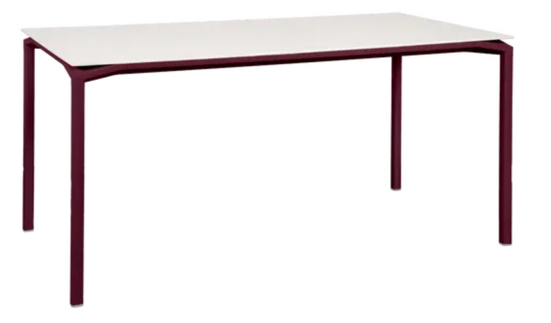 Load image into Gallery viewer, Black Fermob CALVI AERIS mineral dining table, 160x80 cm, six-seater, with sleek black cherry finish, perfect for modern dining spaces.
