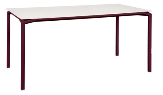 Black Fermob CALVI AERIS mineral dining table, 160x80 cm, six-seater, with sleek black cherry finish, perfect for modern dining spaces.