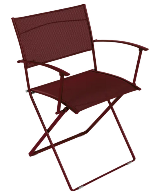 Black Fermob Plein Air Armchair folding chair with black cherry finish, lightweight and portable for outdoor use.