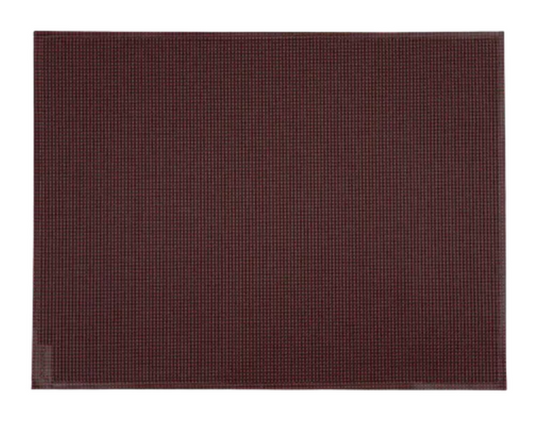 Black Fermob BASICS placemat measuring 45 x 35 cm with a sleek black cherry design, perfect for protecting surfaces during meals.