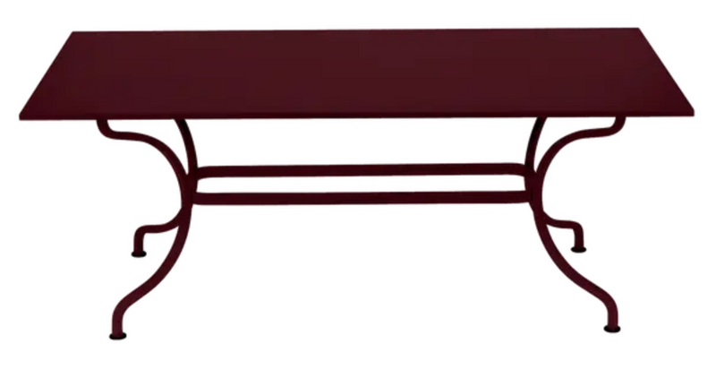 Load image into Gallery viewer, Black Fermob Romane table measuring 180 x 100 cm, designed for up to 8 guests, shown in black cherry finish.

