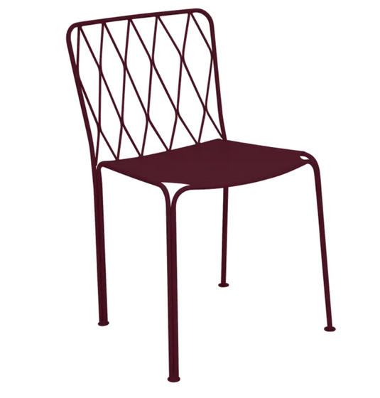Black Fermob Kintbury stackable outdoor metal chair with a sleek design, suitable for restaurant or garden outdoor furniture.
