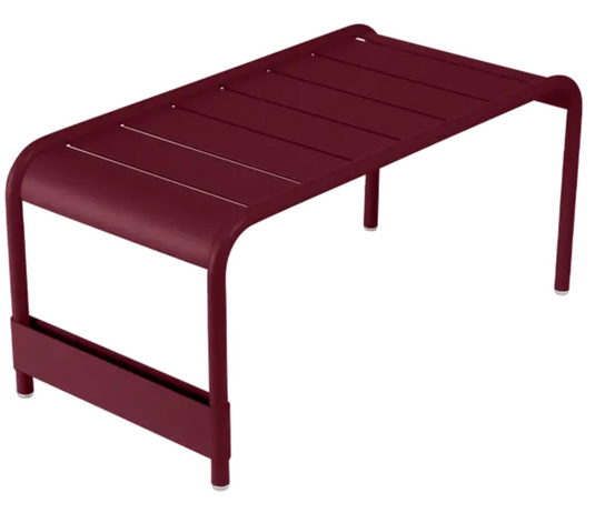 Black Fermob Luxembourg large low table or bench measuring 86x44, featuring a sleek, modern design with a smooth surface and sturdy legs.