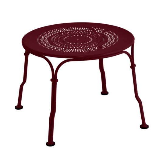 Black Fermob 1900 low table with 45 cm diameter, featuring a sleek round metal design for modern outdoor or indoor spaces.