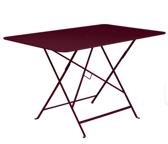 Black Fermob foldable bistro table, 117x77 cm, outdoor metal furniture with a sleek, compact design for outdoor dining or patio use.