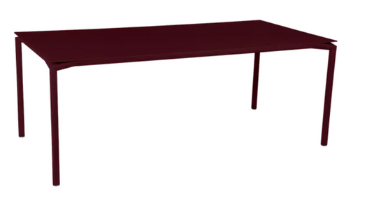 Black Fermob Calvi rectangular outdoor dining table, 195x95 cm, eight-seater, suitable for outdoor and indoor use.
